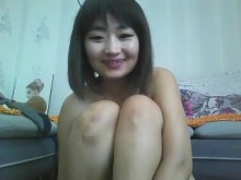 Adorable chino camgirl deepthroats consolador