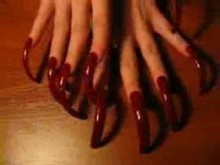 Uñas rojas sexy muy largas